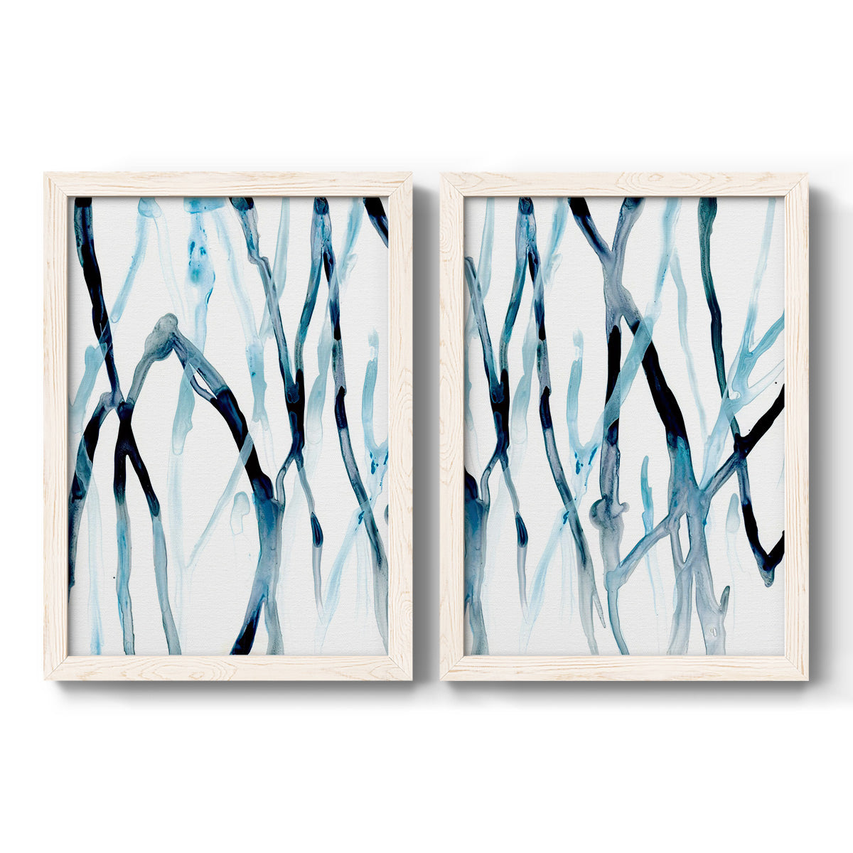 Set of two white barnwood framed canvas prints featuring two fluid organic abstracts featuring branching watercolor lines drifting across white.