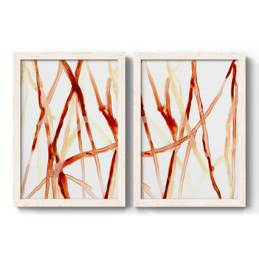 Set of two white barnwood framed canvas prints featuring two fluid organic abstracts featuring branching watercolor lines drifting across white.