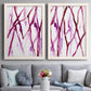 Set of two white barnwood framed canvas prints depicting paired fluid organic abstracts with slender vein-like strokes, transparent overlaps, and open negative space above a sofa in a contemporary living room.