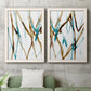 Set of two white barnwood framed canvas prints depicting a watercolor pair of elongated blue and umber trails with transparent overlapping edges above a sofa in a modern living room.
