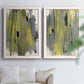 Set of two white barnwood framed canvas prints depicting scraped paint, black accents, and layered gray green rust or yellow fields arranged across two complementary compositions above a sofa in a bright living space.