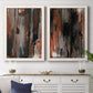 Set of two white barnwood framed canvas prints depicting a coordinated art pair of vertical abstract brush bands in changing muted palettes rendered as urban mixed-media abstracts above a dining room sideboard.