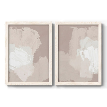 Set of two white barnwood framed canvas prints featuring two neutral minimalist abstracts featuring soft taupe blush and white paint blocks.