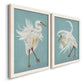 Angled view of a set of two white barnwood framed canvas prints featuring two decorative bird illustrations featuring white herons displaying long windswept feathers.