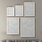 Size comparison chart for a set of two white barnwood framed canvas prints.