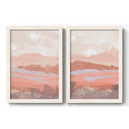 Set of two white barnwood framed canvas prints featuring two modern abstract landscapes featuring layered blush terracotta and blue desert horizons.