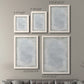 Size comparison chart for a set of two white barnwood framed canvas prints.