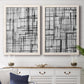 Set of two white barnwood framed canvas prints depicting a coordinated art pair of layered black linear grids rendered as monochrome geometric abstracts above a dining room sideboard.