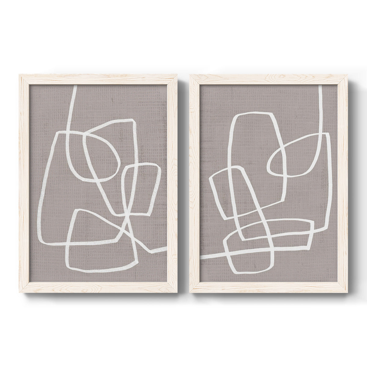 Set of two white barnwood framed canvas prints featuring two minimalist geometric line art featuring overlapping white continuous-line loops on taupe.