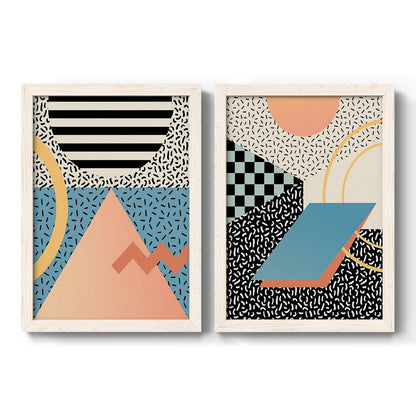 Set of two white barnwood framed canvas prints featuring two retro graphic abstracts featuring bold geometric Memphis-style patterns.