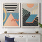 Set of two white barnwood framed canvas prints depicting a coordinated art pair of bold geometric Memphis-style patterns rendered as retro graphic abstracts above a dining room sideboard.