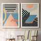 Set of two white barnwood framed canvas prints depicting two retro graphic abstracts featuring bold geometric Memphis-style patterns above a sideboard in a cozy sitting room.