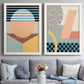 Set of two white barnwood framed canvas prints depicting paired retro graphic abstracts with checkerboards stripes squiggles peach blue black and mint shapes above a sofa in a contemporary living room.