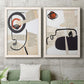 Set of two white barnwood framed canvas prints depicting a coordinated art pair of cubist faces layered over vintage book pages rendered as mixed-media portrait collages above a sofa in a modern living room.