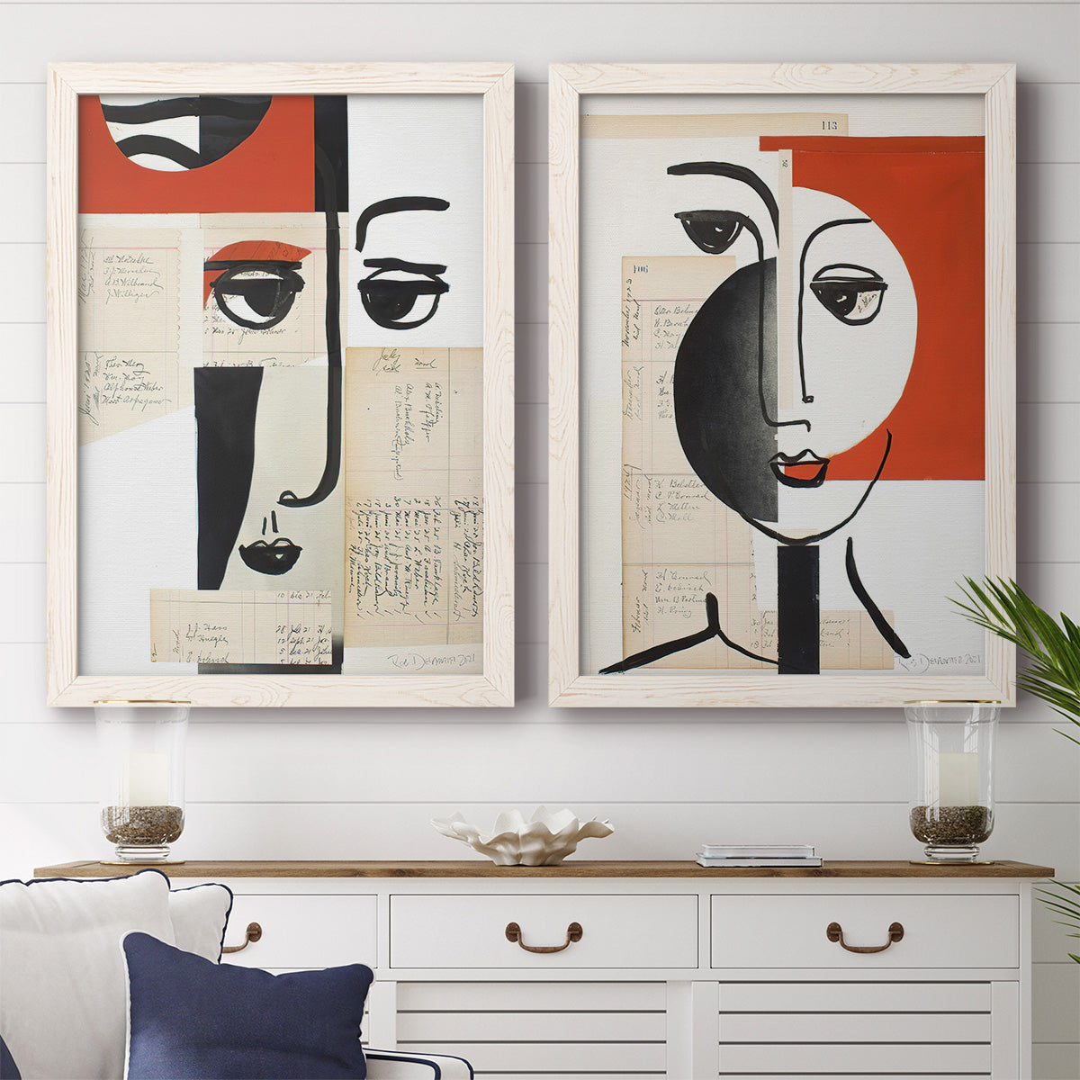 Set of two white barnwood framed canvas prints depicting a coordinated art pair of cubist faces layered over vintage book pages rendered as mixed-media portrait collages above a dining room sideboard.