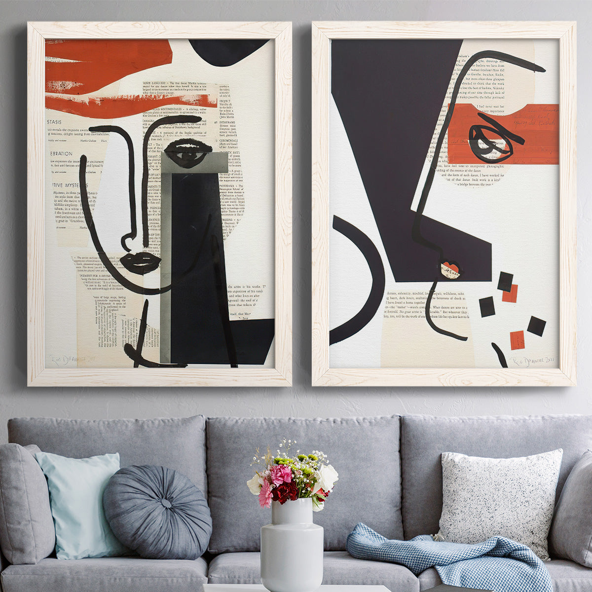 Set of two white barnwood framed canvas prints depicting paired mixed-media portrait collages with black contour features, red blocks, typography, and torn-paper textures above a sofa in a contemporary living room.