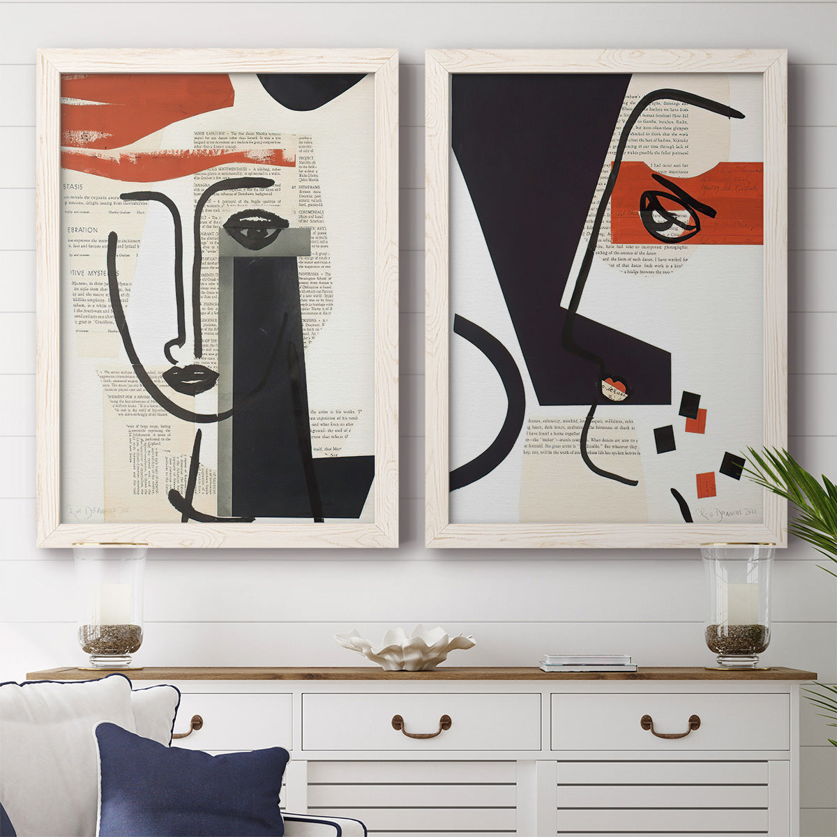 Set of two white barnwood framed canvas prints depicting a coordinated art pair of cubist faces layered over vintage book pages rendered as mixed-media portrait collages above a dining room sideboard.