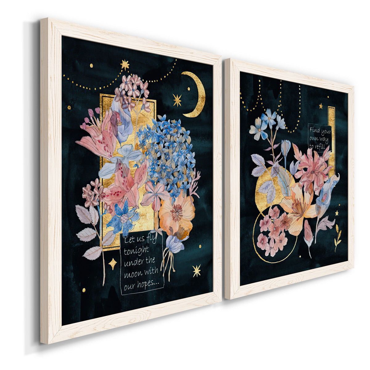 Angled view of a set of two white barnwood framed canvas prints featuring two whimsical floral collages featuring fantastical bouquets and celestial symbols on black.