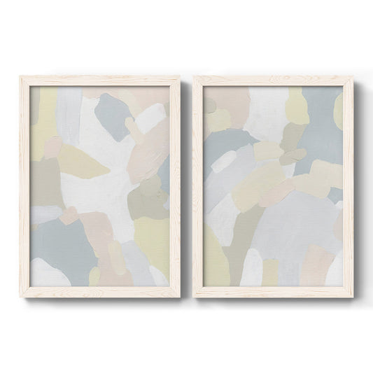 Set of two white barnwood framed canvas prints featuring two quiet contemporary abstracts featuring soft overlapping pastel brush shapes.