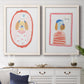 Set of two white barnwood framed canvas prints depicting a coordinated art pair of playful framed portraits of fashionable cats and dogs rendered as whimsical nursery illustrations above a dining room sideboard.