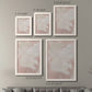 Size comparison chart for a set of two white barnwood framed canvas prints.