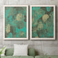 Set of two white barnwood framed canvas prints depicting a coordinated art pair of layered mint teal and beige circular forms rendered as textured organic abstracts above a sofa in a modern living room.