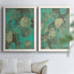Set of two white barnwood framed canvas prints depicting overlapping orbs, translucent prints, and weathered green grounds arranged across two complementary compositions above a sofa in a bright living space.