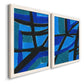 Angled view of a set of two white barnwood framed canvas prints featuring two bold geometric abstracts featuring intersecting black bars over vivid blue fields.