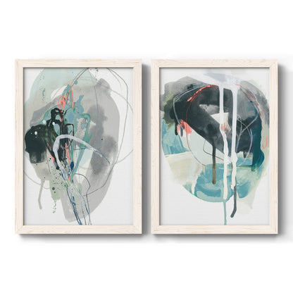 Set of two white barnwood framed canvas prints featuring two bold gestural abstracts featuring large black gray and teal circular gestures.