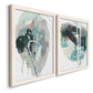 Angled view of a set of two white barnwood framed canvas prints featuring two bold gestural abstracts featuring large black gray and teal circular gestures.
