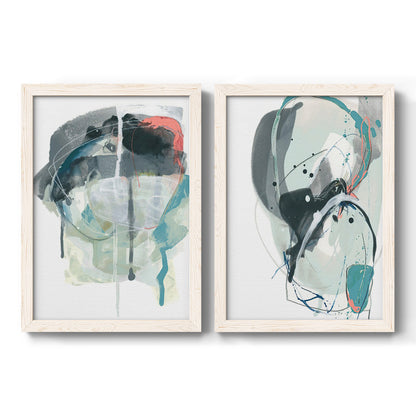 Set of two white barnwood framed canvas prints featuring two bold gestural abstracts featuring large black gray and teal circular gestures.