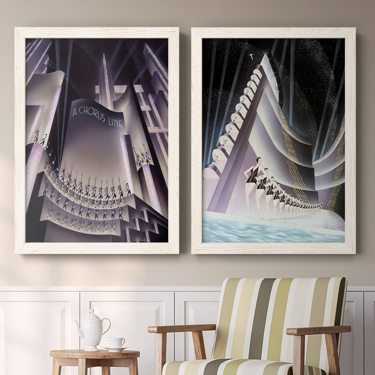 Set of two white barnwood framed canvas prints depicting two vintage architectural illustrations featuring dramatic Art Deco city and theater scenes above a sideboard in a cozy sitting room.