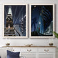 Set of two white barnwood framed canvas prints depicting a vintage urban pair of towering architecture searchlights stars and shadowed people at night above a dining room sideboard.