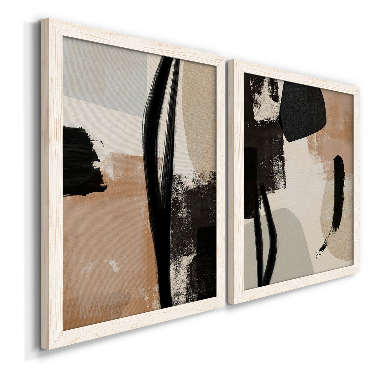 Angled view of a set of two white barnwood framed canvas prints featuring two minimalist collage-like abstracts featuring black taupe cream and beige painted forms.