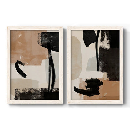 Set of two white barnwood framed canvas prints featuring two minimalist collage-like abstracts featuring black taupe cream and beige painted forms.