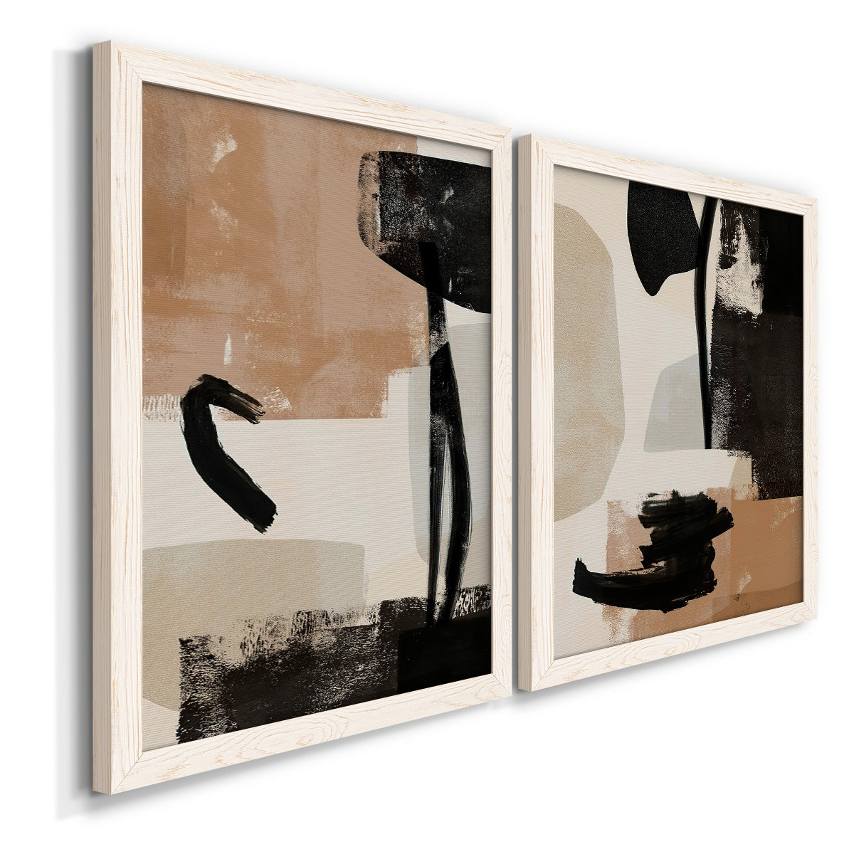 Angled view of a set of two white barnwood framed canvas prints featuring two minimalist collage-like abstracts featuring black taupe cream and beige painted forms.