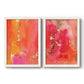 Set of two white barnwood framed canvas prints featuring two glamorous fluid abstracts featuring luminous coral orange and pink color fields with gold flecks.