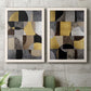 Set of two white barnwood framed canvas prints depicting a coordinated art pair of interlocking black gray cream and gold geometric sections rendered as structured modern abstracts above a sofa in a modern living room.