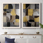 Set of two white barnwood framed canvas prints depicting a coordinated art pair of interlocking black gray cream and gold geometric sections rendered as structured modern abstracts above a dining room sideboard.