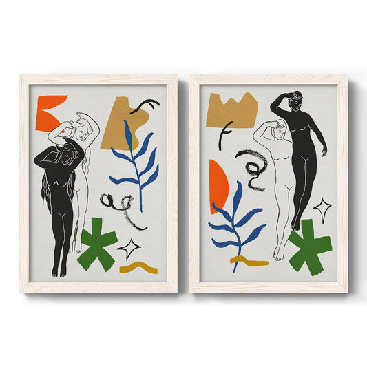 Set of two white barnwood framed canvas prints featuring two graphic figurative collages of women with bold botanical shapes stars and abstract symbols.