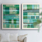 Set of two white barnwood framed canvas prints depicting repeating vertical dashes, grid rhythms, and textile-like structure arranged across two complementary compositions above a sofa in a bright living space.