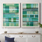 Set of two white barnwood framed canvas prints depicting a coordinated art pair of dense rows of teal black and white linear marks rendered as graphic woven-pattern abstracts above a dining room sideboard.
