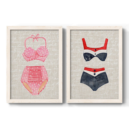 Set of two white barnwood framed canvas prints featuring two vintage fashion illustrations featuring retro two-piece swimsuits displayed on textured linen grounds.