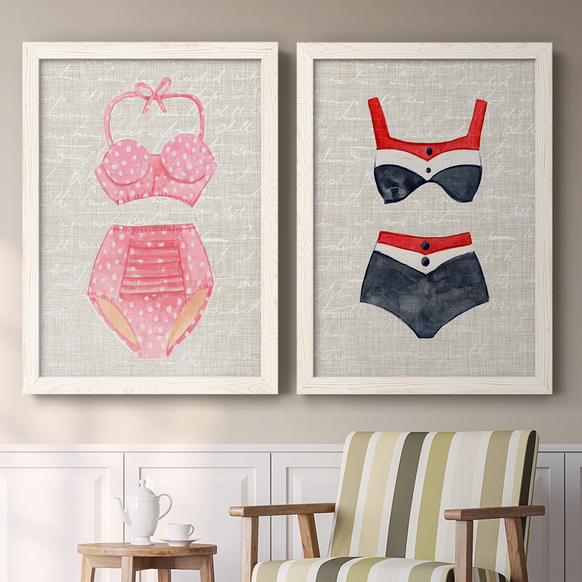 Set of two white barnwood framed canvas prints depicting two vintage fashion illustrations featuring retro two-piece swimsuits displayed on textured linen grounds above a sideboard in a cozy sitting room.