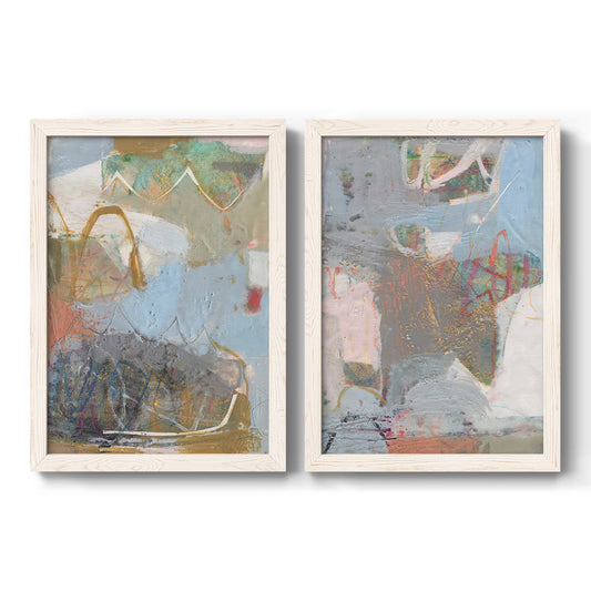 Set of two white barnwood framed canvas prints featuring two coordinated abstract artworks featuring layered shapes lines and painterly textures.