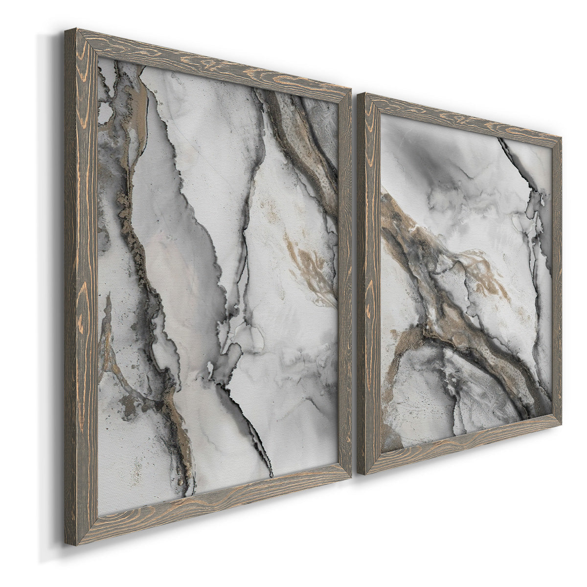 Angled view of a set of two gray barnwood framed canvas prints featuring two marbled alcohol ink abstracts with flowing black gray white and metallic gold veining.
