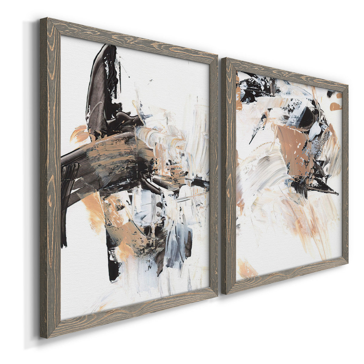 Angled view of a set of two gray barnwood framed canvas prints featuring two bold mixed-media abstracts featuring energetic black white tan and gray painted gestures.