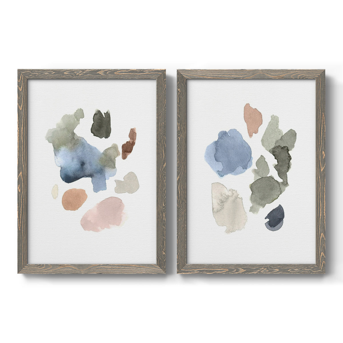 Set of two gray barnwood framed canvas prints featuring two airy minimalist abstracts featuring scattered translucent watercolor shapes.