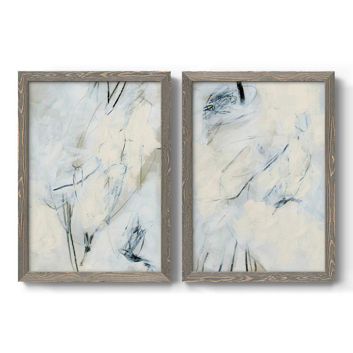 Set of two gray barnwood framed canvas prints featuring two airy gestural abstracts featuring pale blue cream and charcoal marks drifting across white.