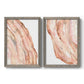 Set of two gray barnwood framed canvas prints featuring two soft marble-inspired abstracts featuring flowing blush peach and cream mineral bands.